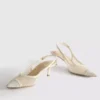 Zapatos de tacón con talón abierto de malla de horma ancha