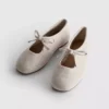 Zapatos planos con detalle de moño