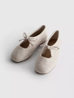 Zapatos planos con detalle de moño