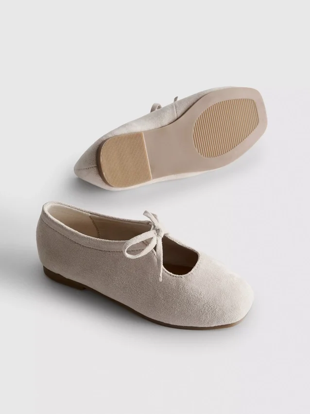 Zapatos planos con detalle de moño