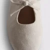 Zapatos planos con detalle de moño