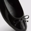 Zapatos planos de charol